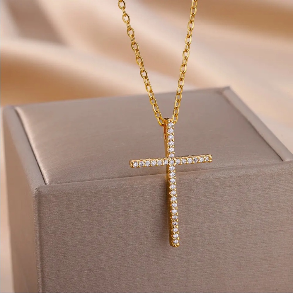 Gold tone CZ cross necklace
